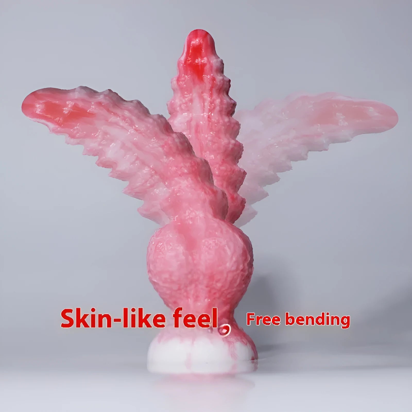 Pink platinum silicone shaped penis masturbation device for adults on a neutral background.