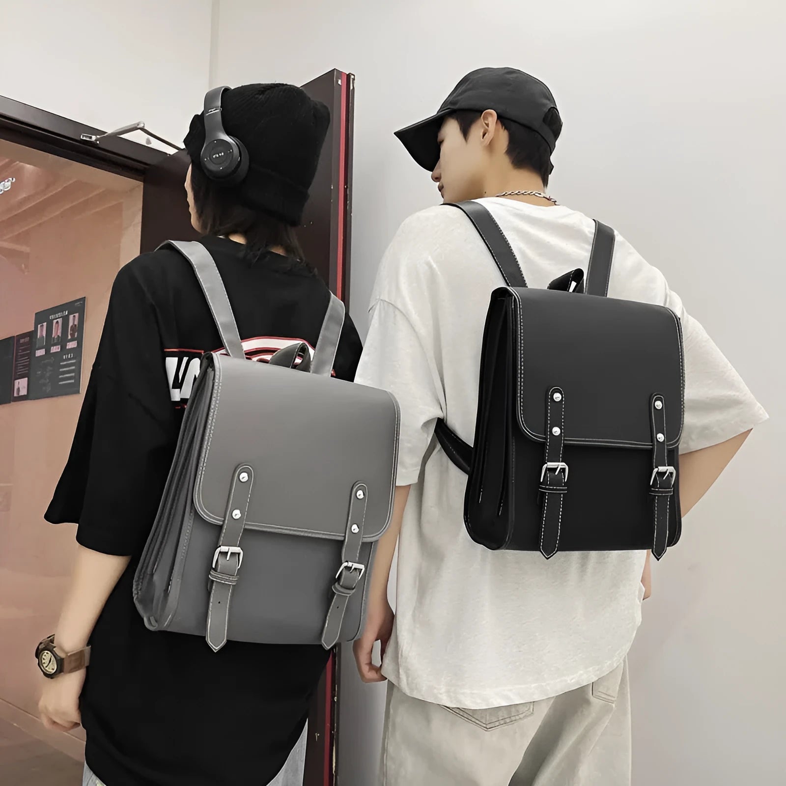 PU leather motorcycle-style buckle laptop backpack with geometric pattern in black, gray, and white, 20-35 litres capacity