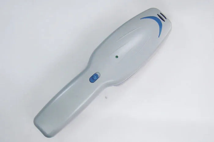 Negative ion pet grooming comb with removable brush head, measuring approximately 21.5cm long