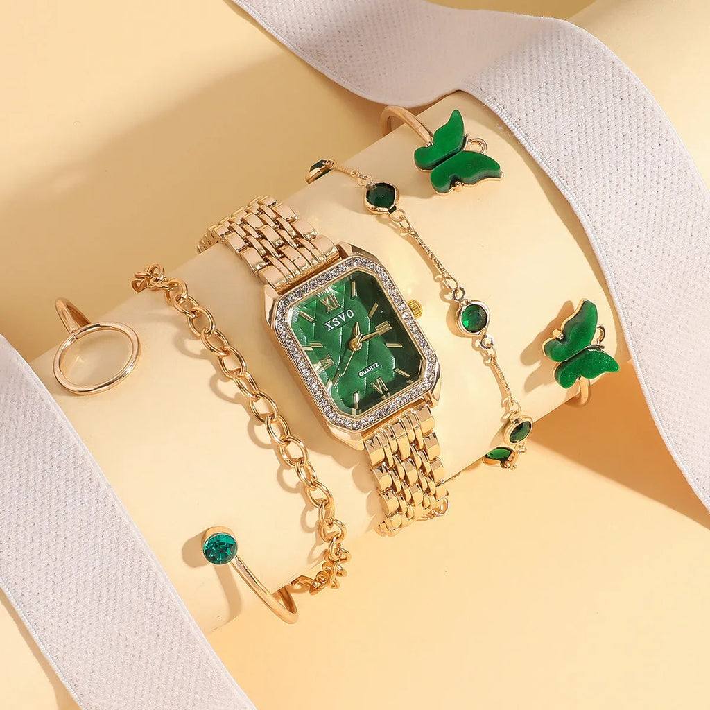 Gold green square women's watch and four matching butterfly bracelets from a five-piece fashion jewellery set.