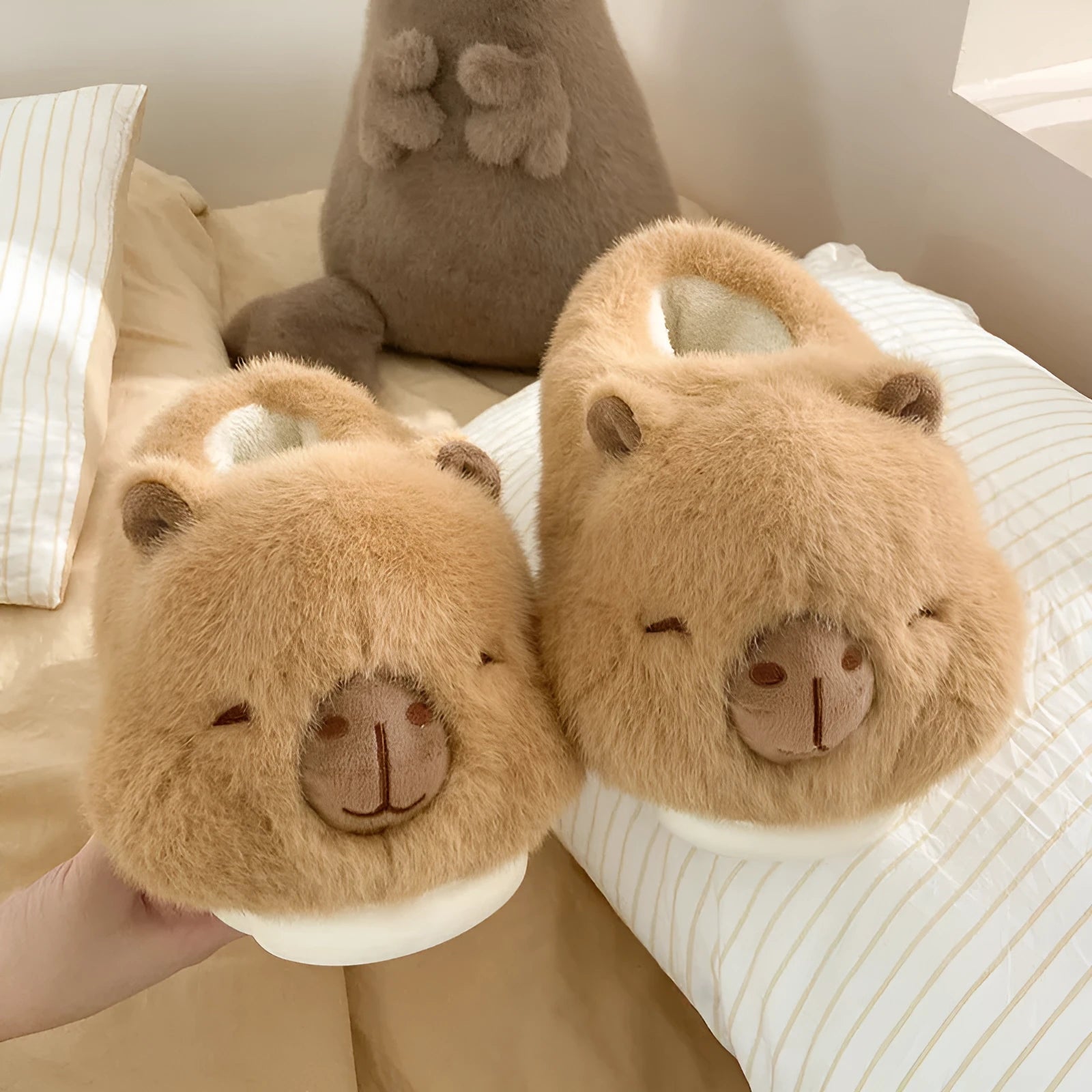 Light brown women's winter plush slippers with artificial wool lining and PVC sole