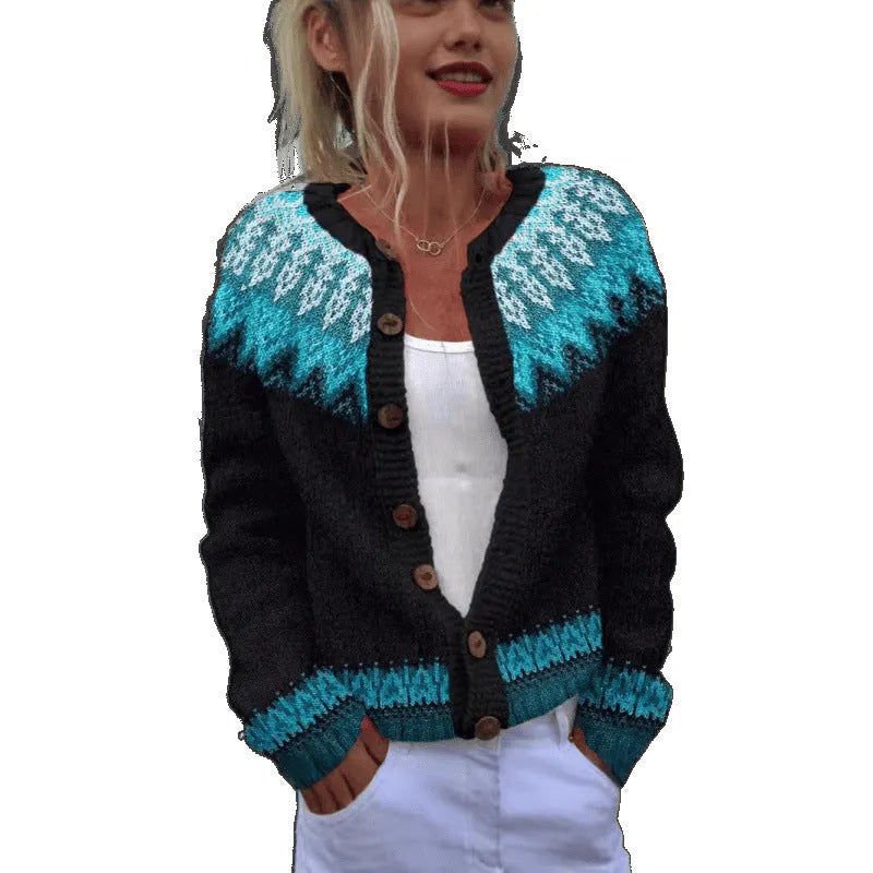Yellow cardigan coat with a raised 3D pattern, shown on a hanger.