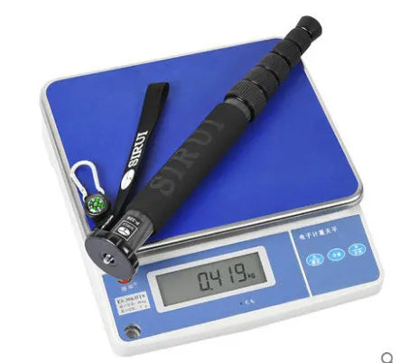 Black carbon fibre telescopic camera monopod for SLR photography