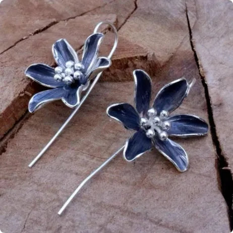 Purple flower-shaped earrings with electroplated finish and alloy construction