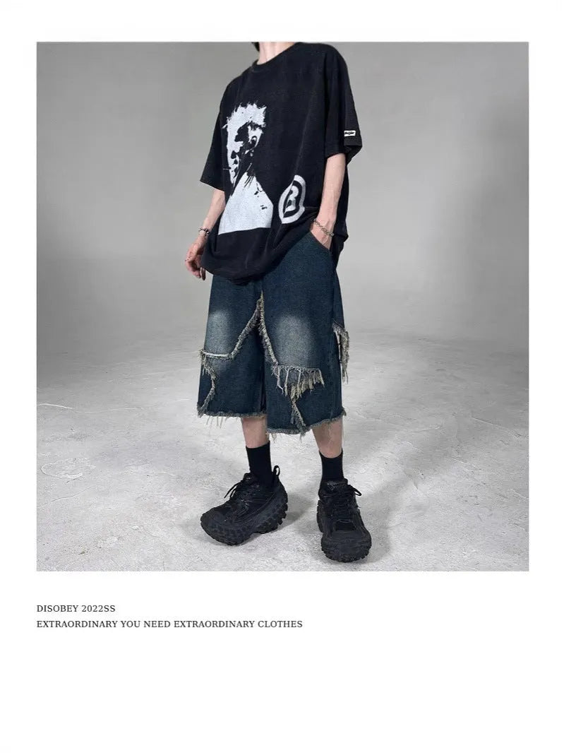 Men's blue denim shorts with five-pointed star embroidery and frayed hem in loose fit style