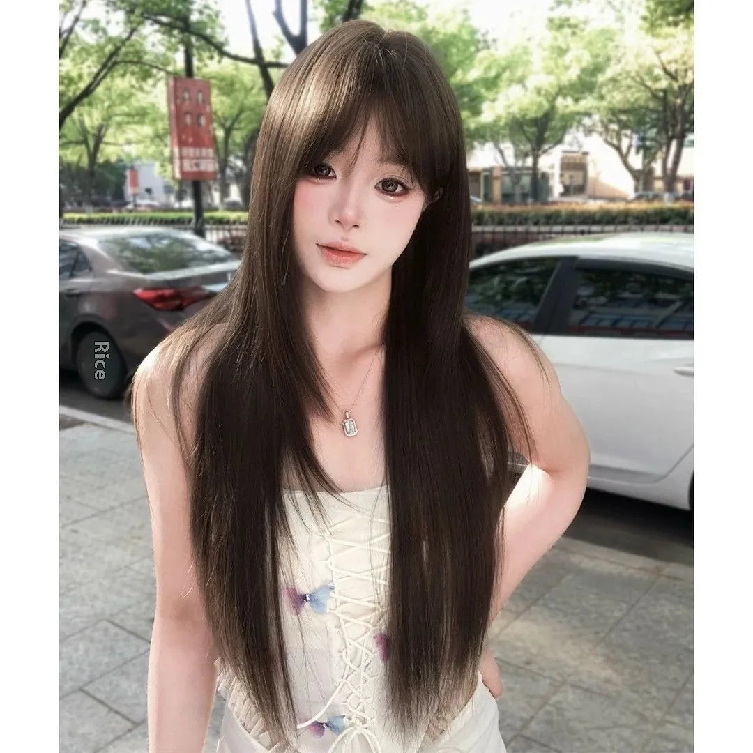 High-temperature fibre wig in Brown Black on wig stand with included care fluid and styling tools