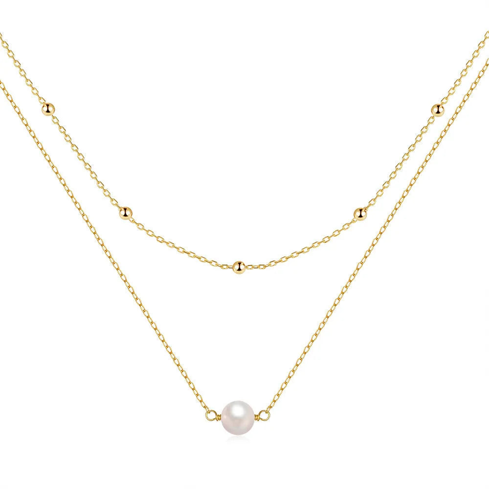 S925 sterling silver double layer necklace with twin diamond-treated pearls and geometric design.