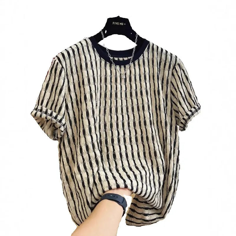 Black men's loose-fitting striped short sleeve pullover top made from silk and linen blend.