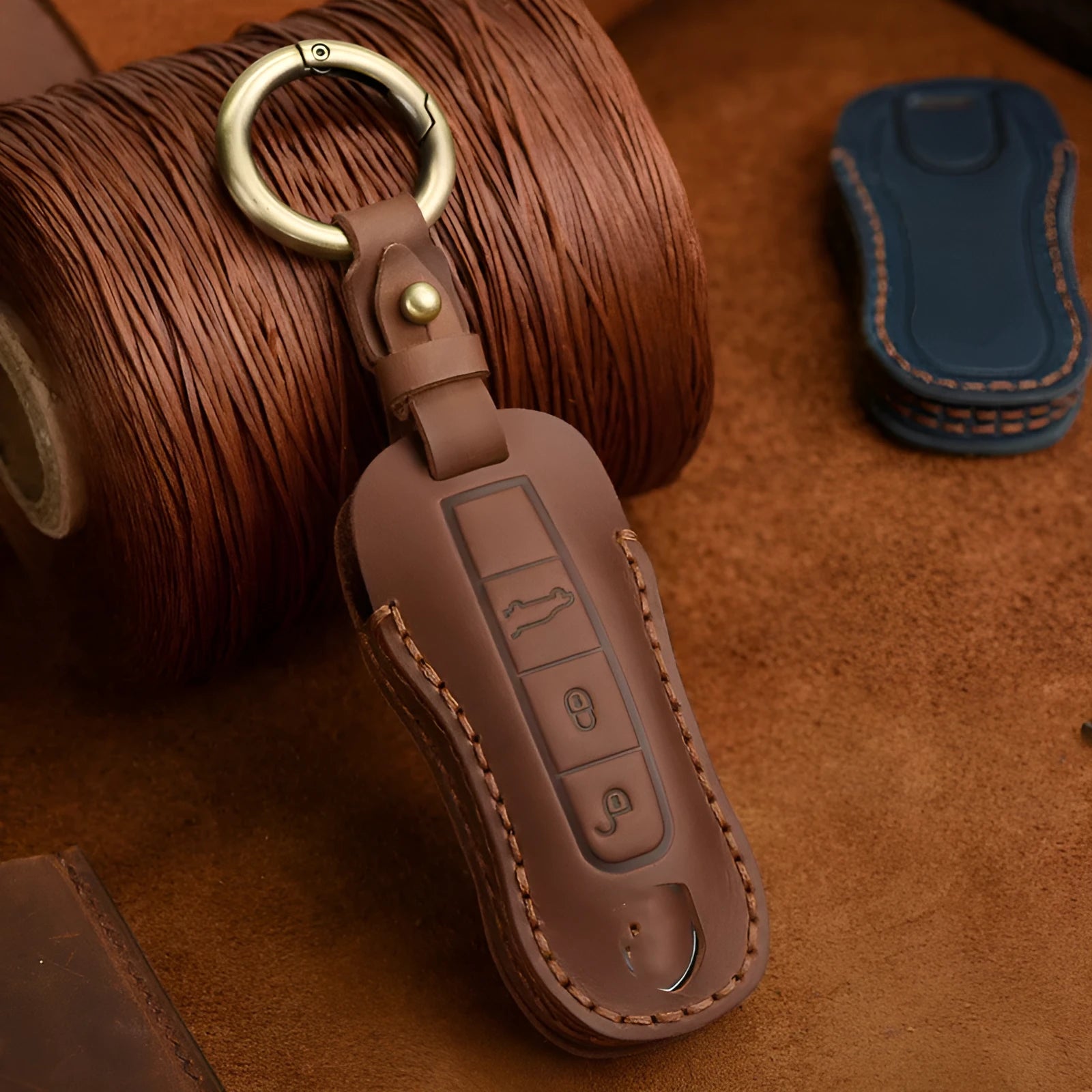 Genuine cowhide leather retro style key cover case for Porsche keys in blue and brown.