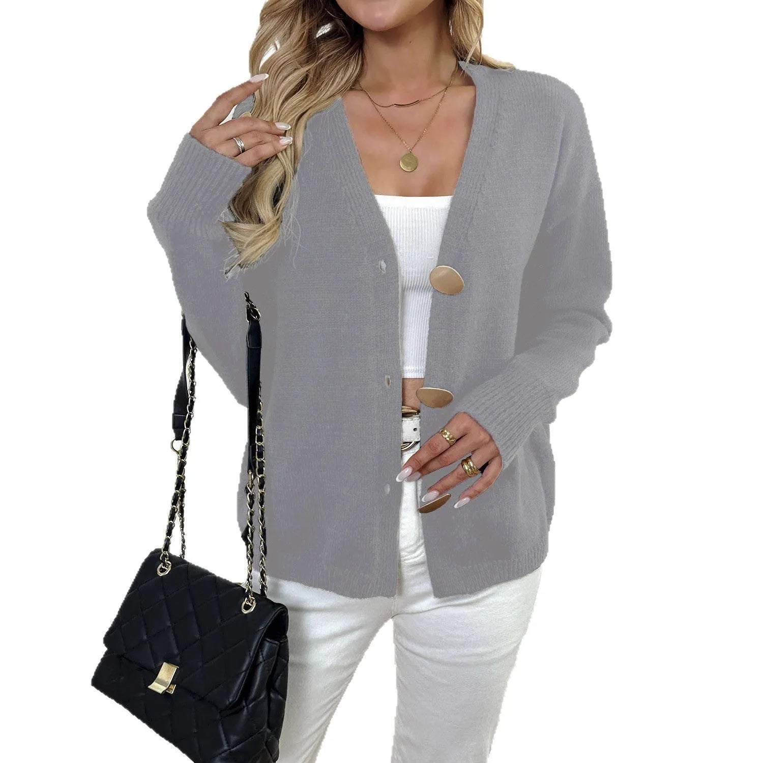 A gray women's long sleeve deer plush sweater coat with princess sleeves on a hanger.