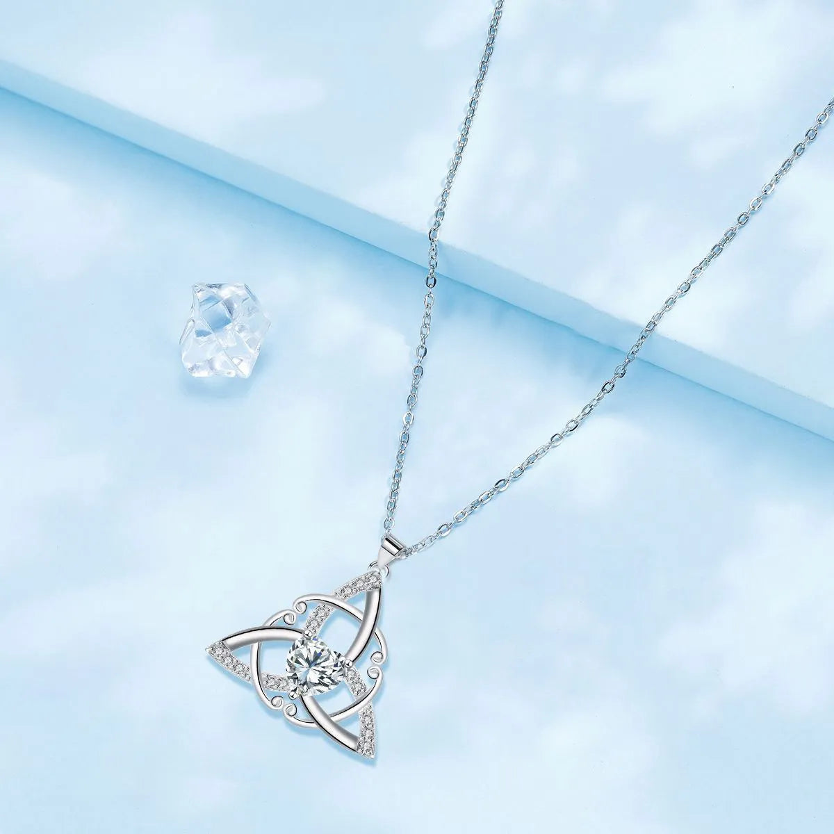 Women's Celtic knot necklace with geometric copper pendant in electroplated finish