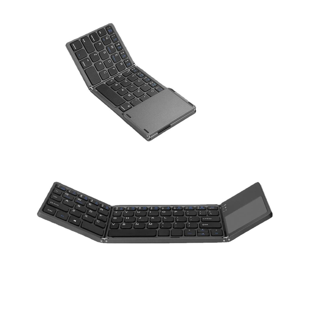 Black tri-fold portable Bluetooth keyboard shown open next to a smartphone, demonstrating its compact size.