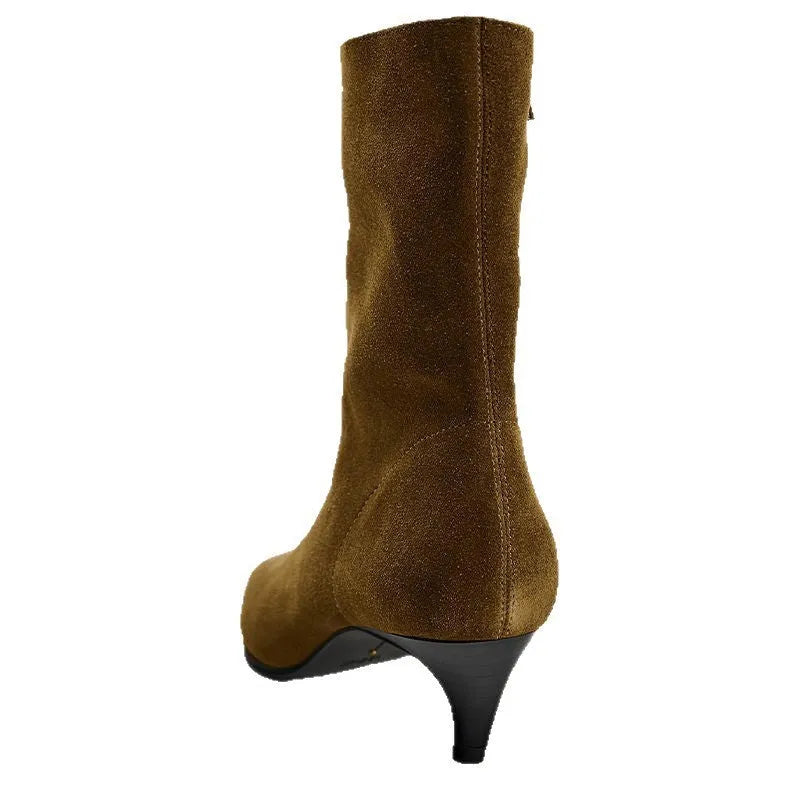 Brown square toe women's boots with a side zipper and a mid stiletto heel on a wooden floor.