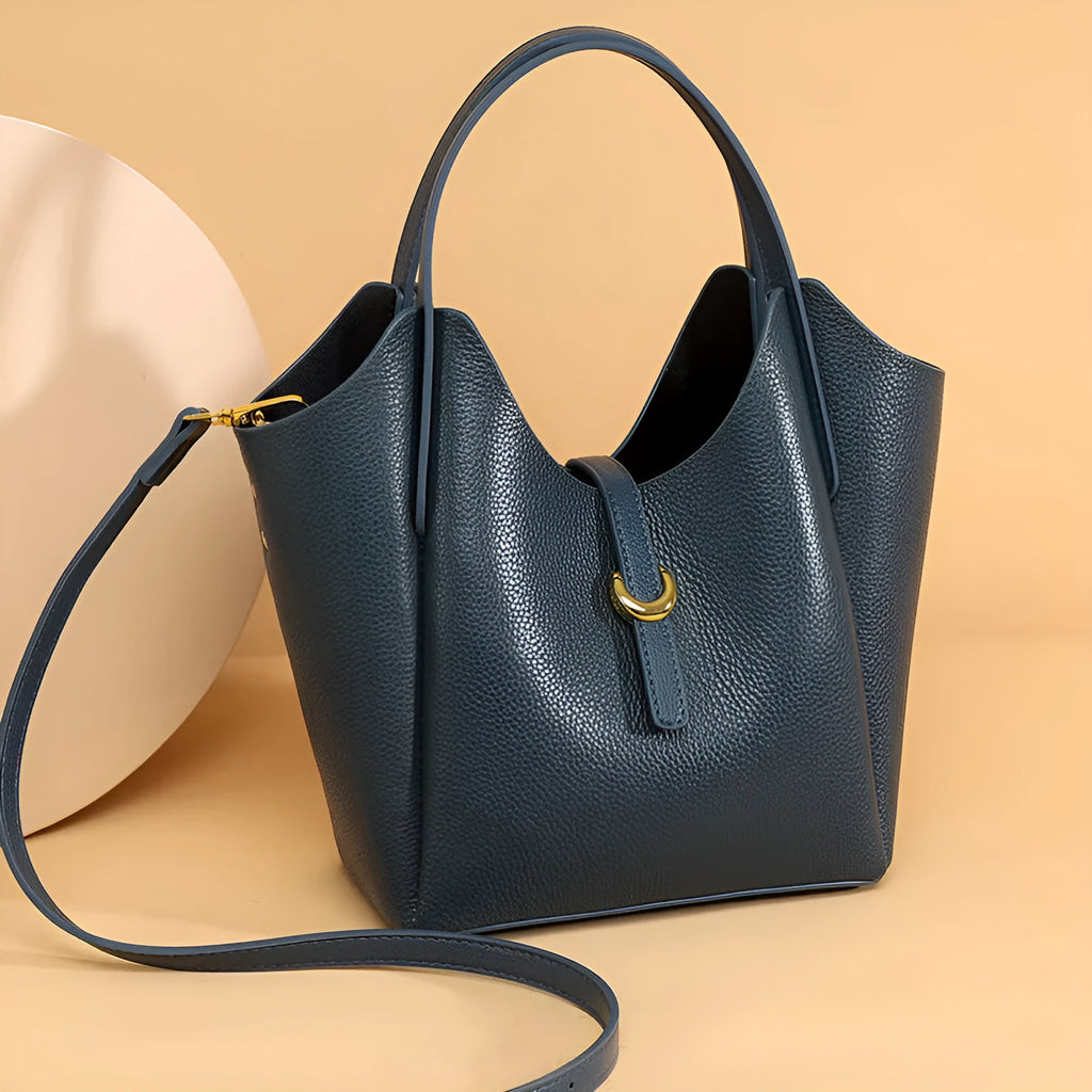 Genuine leather women's bucket bag in hand-held style with visible stitching details