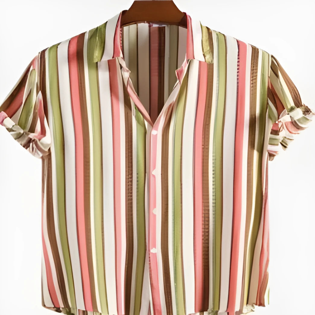 Man wearing a short-sleeved digital print polyester shirt in a colour block design for summer.