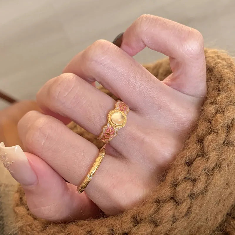 Pink crystal enamel geometric open ring on gold-plated copper band with adjustable cuff design