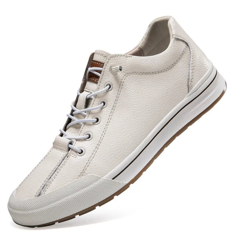 Men's white and black matte leather casual shoes with flat heel and round toe.