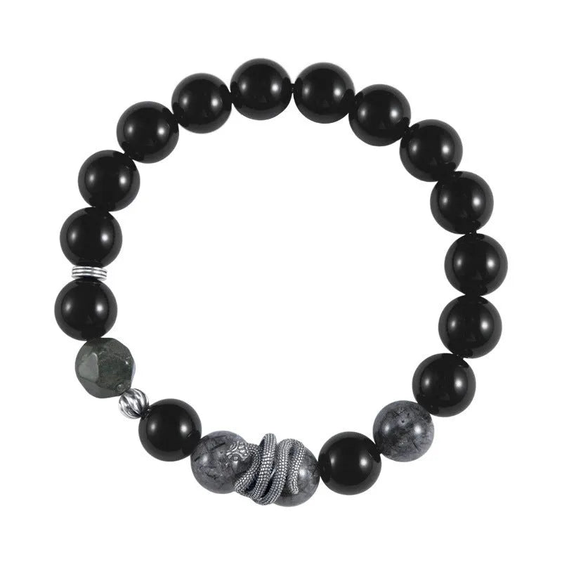 Men's S925 sterling silver bracelet with obsidian black hair crystal and detailed snake zodiac design on a black background.