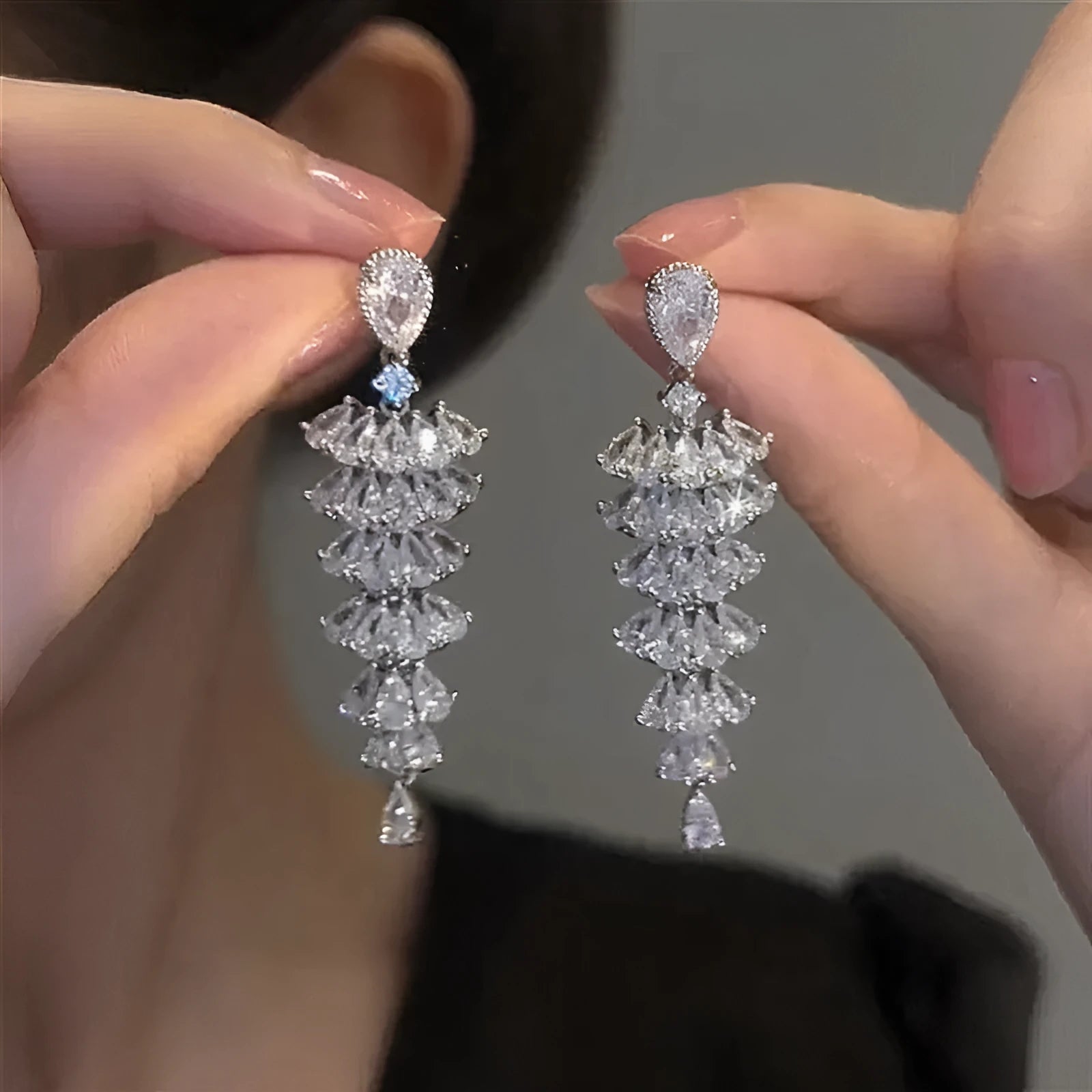 Silver pagoda Christmas tree drop earrings with sparkling zircon crystals on copper stud fittings