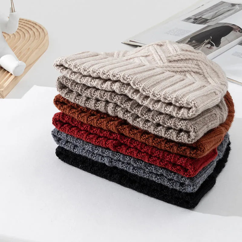 Women's wool knitted dome crown winter hat shown in multiple colour options including ivory white, khaki, and obsidian black.