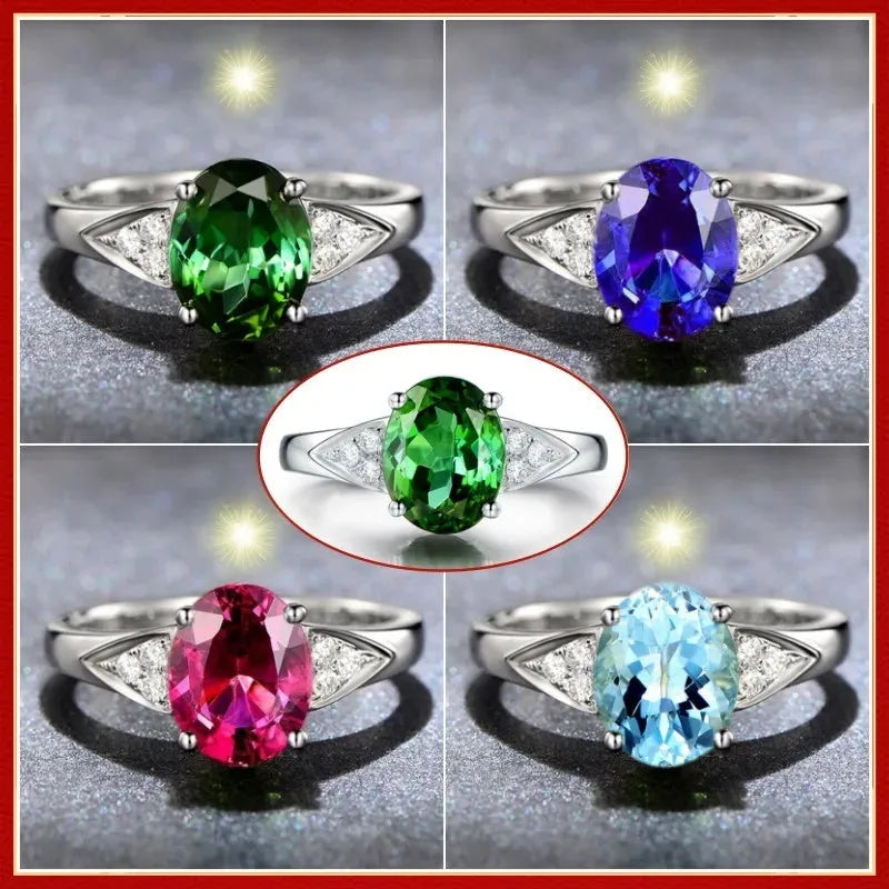 Women's court style ring with natural zircon inlay in heart, drop, or bell pattern, in blue, green, light blue, or red.