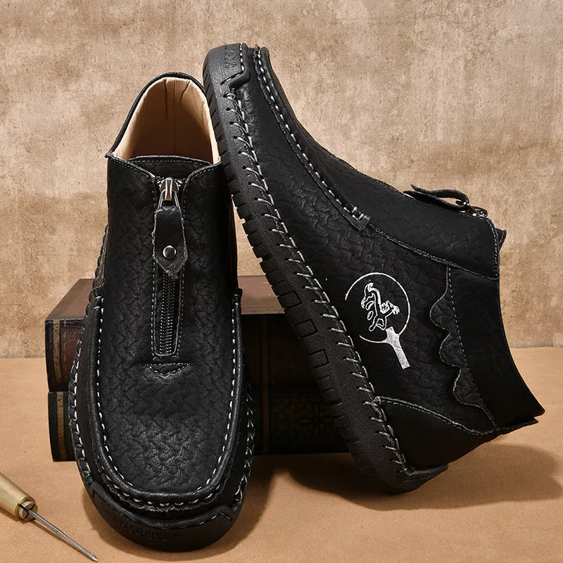 Men's black slip-on leather loafers with round toe and low heel design