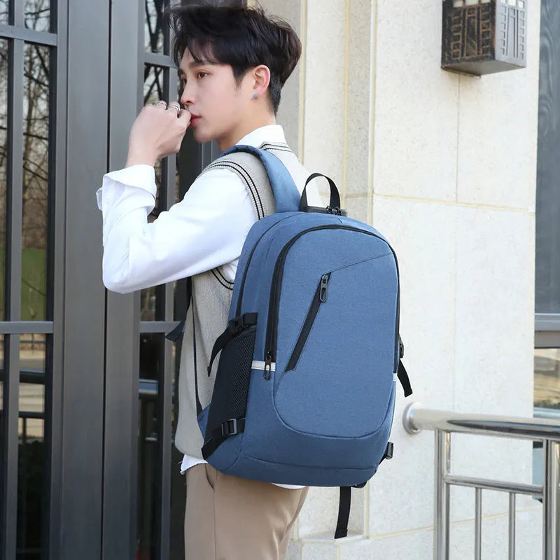 Men's solid colour Oxford cloth computer backpack with 20-35 litre capacity
