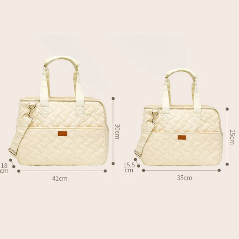 Grey and white pet carrier handbag with mesh panels and multiple pockets