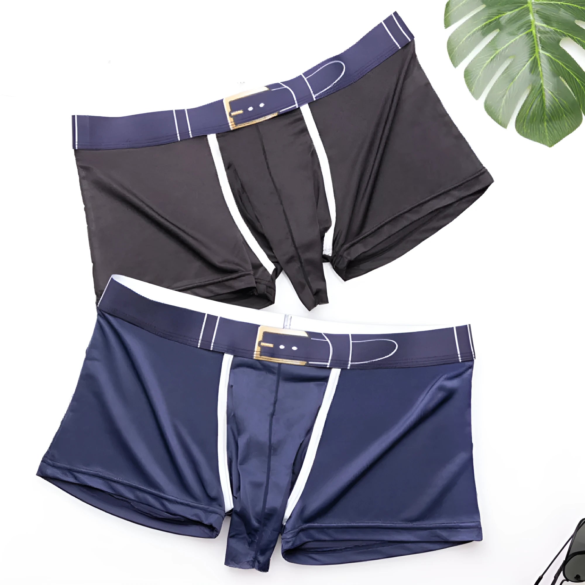 Men's solid colour ice silk boxer shorts laid flat, showing mid-waist design.