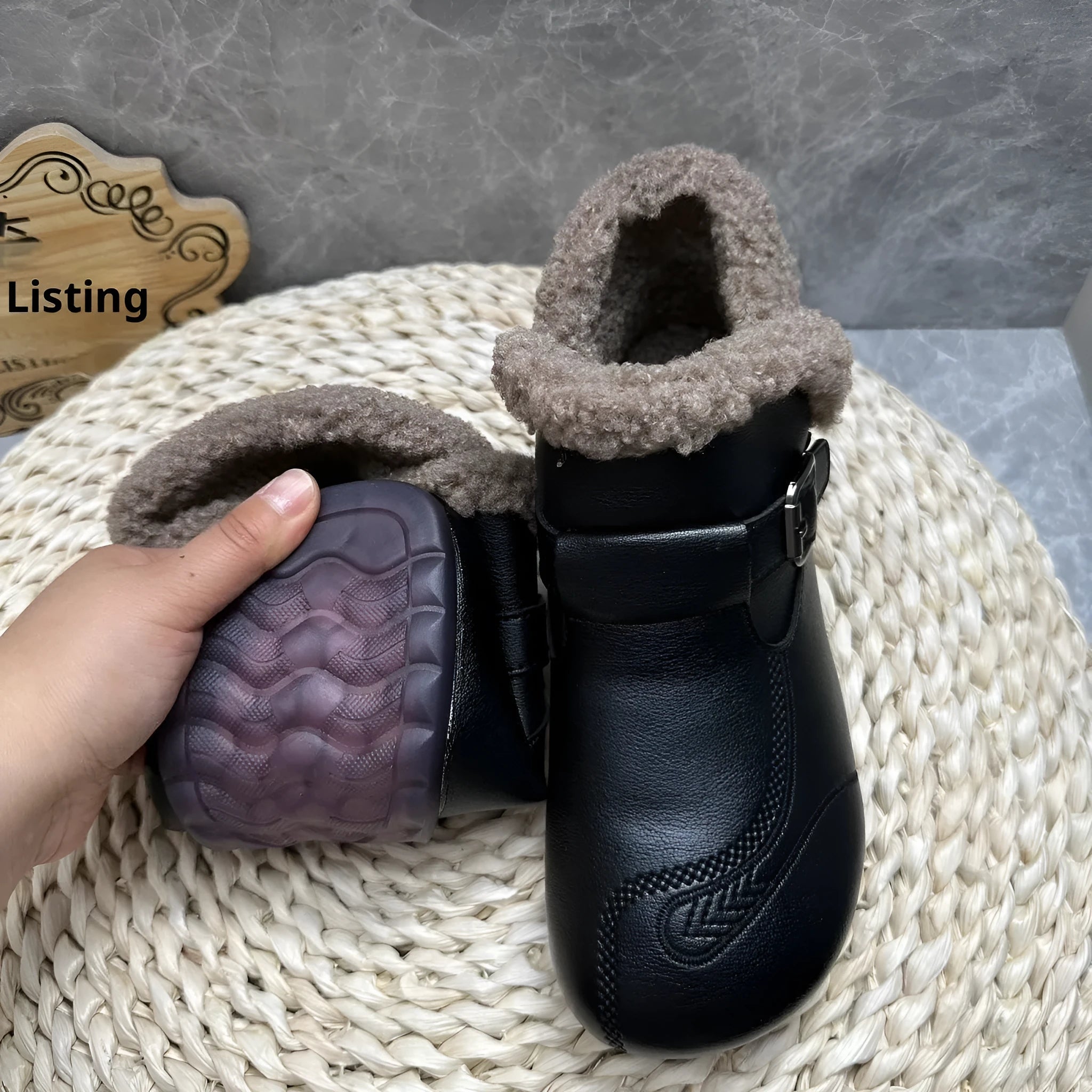 Winter slip-on ankle boots for women in black synthetic leather with low platform heel and round toe