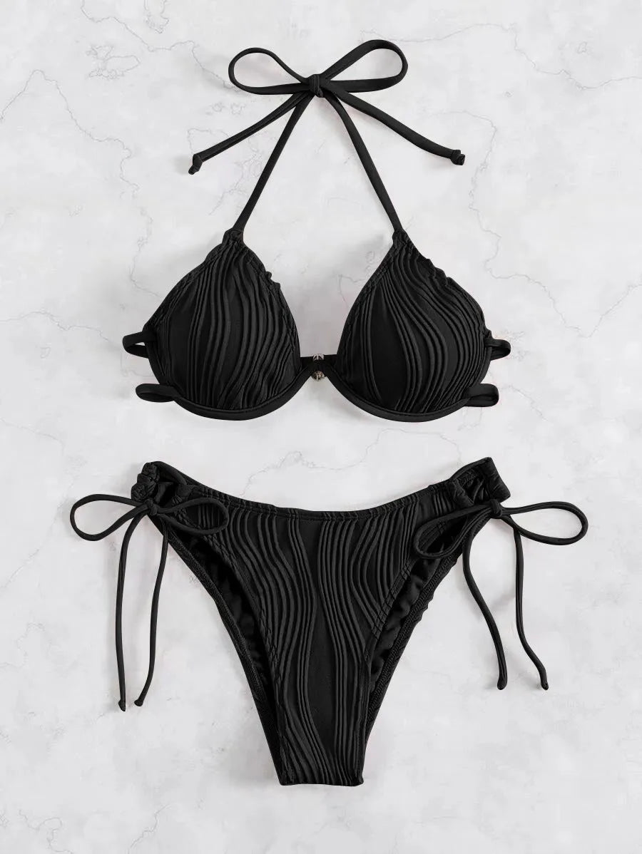 Women's apricot coloured bikini swimsuit with underwire support on a mannequin.