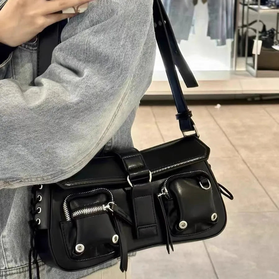 Black PU leather underarm baguette messenger bag with adjustable crossbody strap showing compact dimensions
