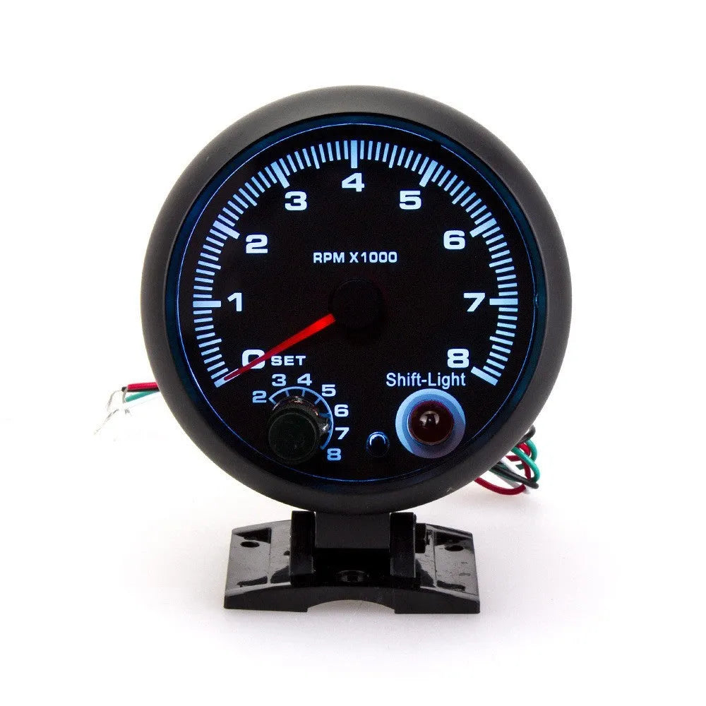 Black automotive tachometer with blue light pointer display for car engine speed measurement