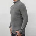 Man wearing a grey zip-up half-turtleneck sweater, a casual cotton blend pullover for leisure.
