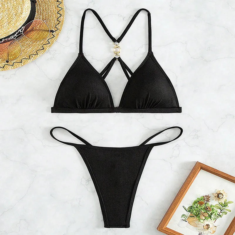 Black women's bikini set with triangle top and hollow backless split design.