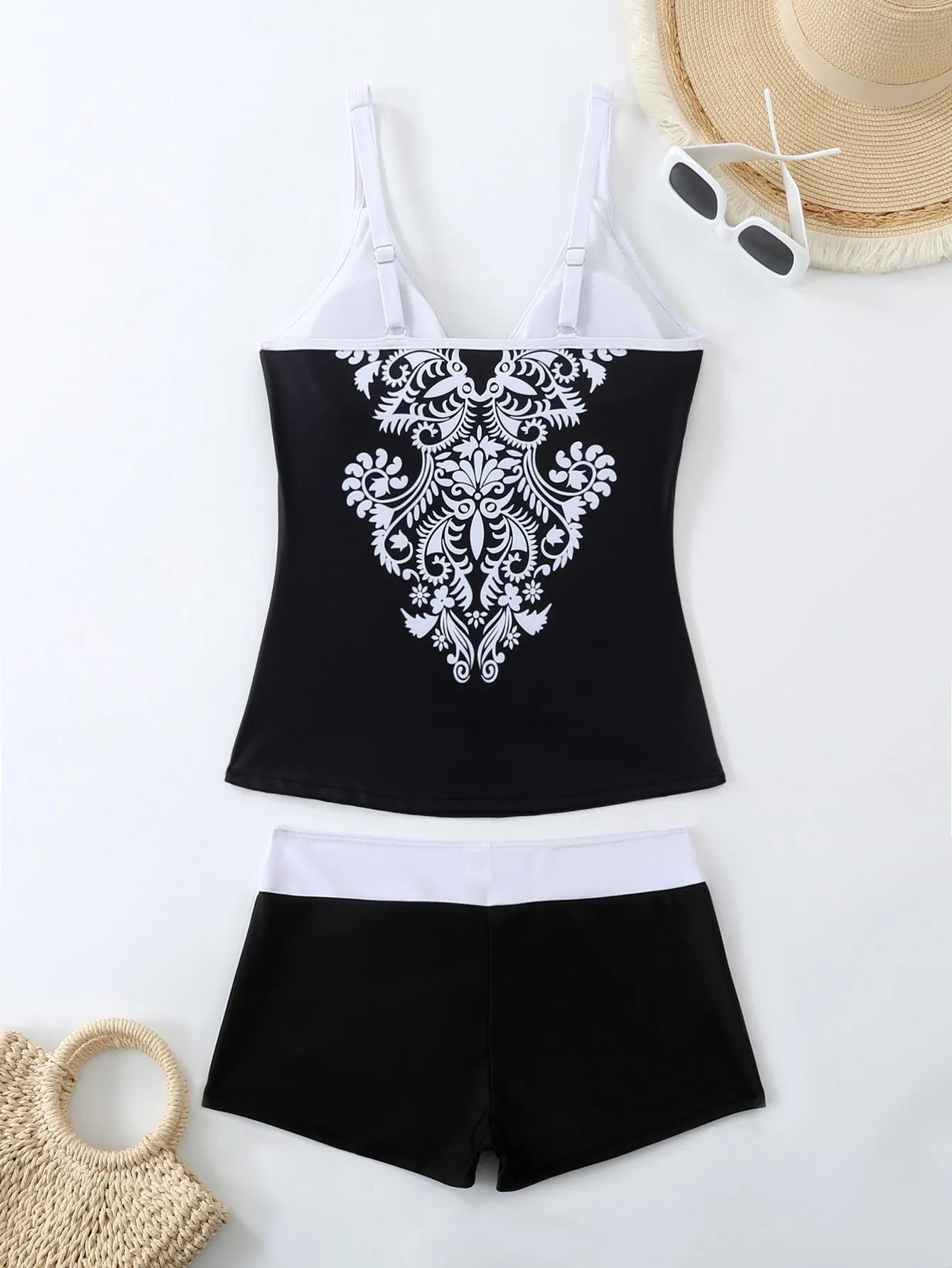 Plus size women's printed two-piece swimsuit in black or rose red with a cotton lining.