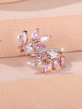 Copper leaf-shaped ring with adjustable band and central horse eye zircon stone in a choice of colours.