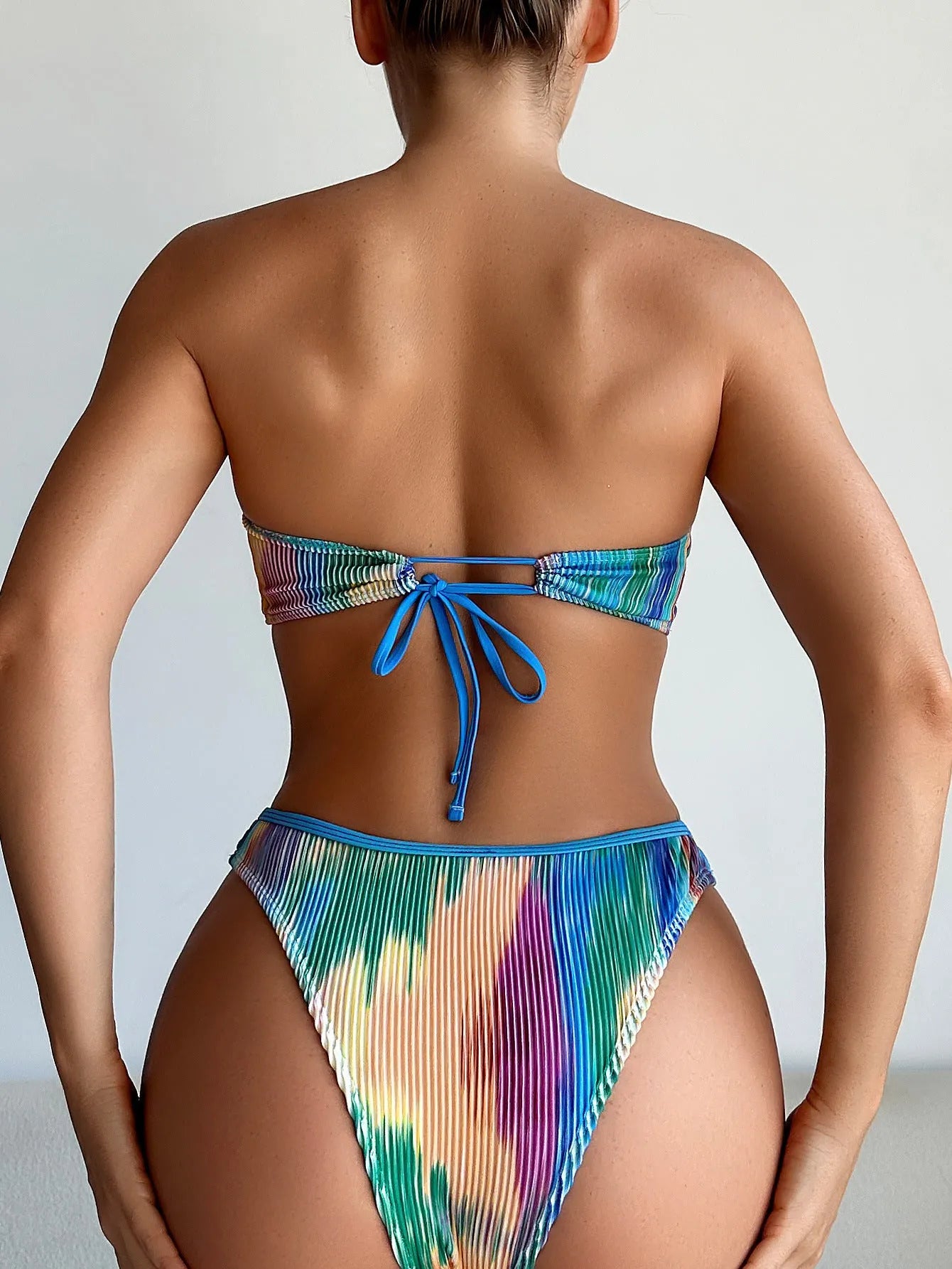 Colour printed women's tube top bikini set with briefs on a white background