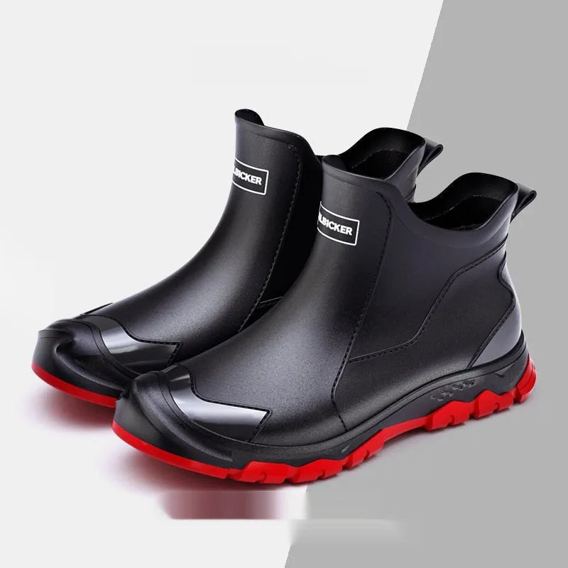 Pair of solid colour low tube PVC wading shoes with a round toe and non-slip plastic sole.