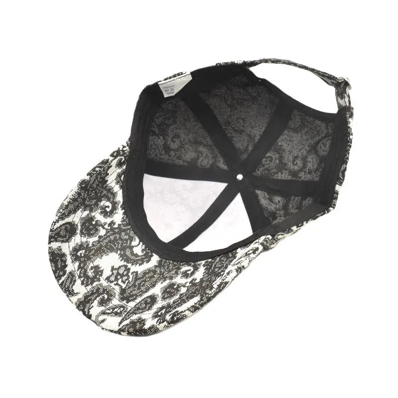 Polyester baseball cap with paisley pattern in blue colour showing dome crown design
