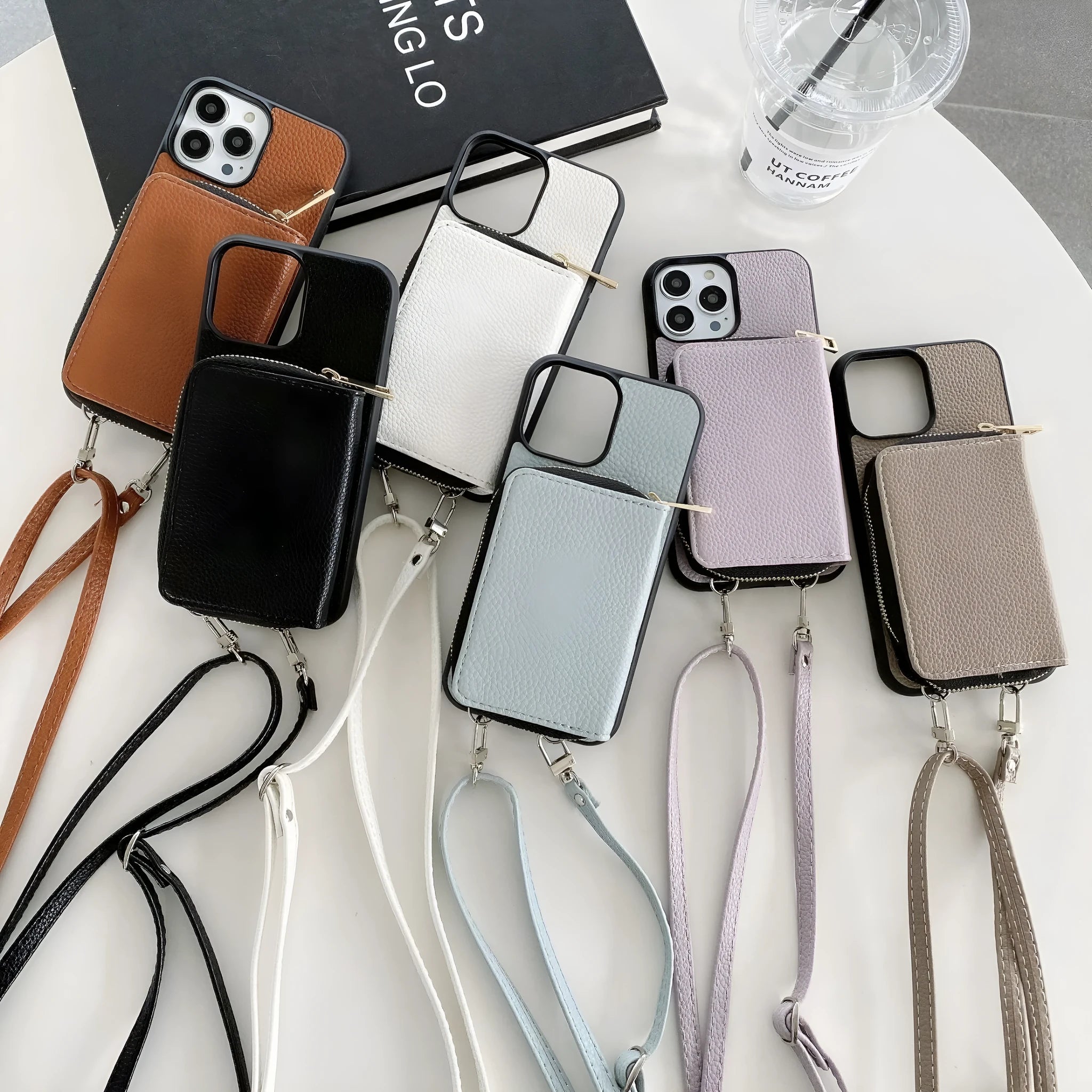 Litchi patterned iPhone protective case in various colours, showing PC and leather construction.