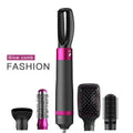 Dyson grey 5-in-1 hair dryer styling brush with interchangeable brush heads on white background