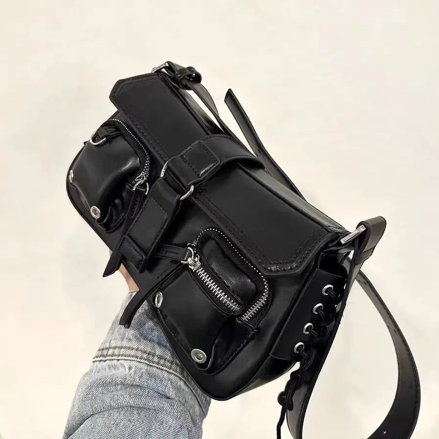 Black PU leather underarm baguette messenger bag with adjustable crossbody strap showing compact dimensions