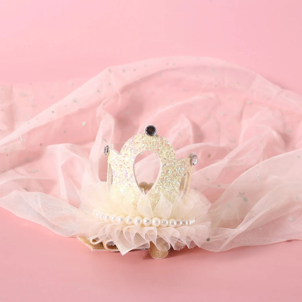 Pet wearing princess crown headdress with floral decoration and attached veil