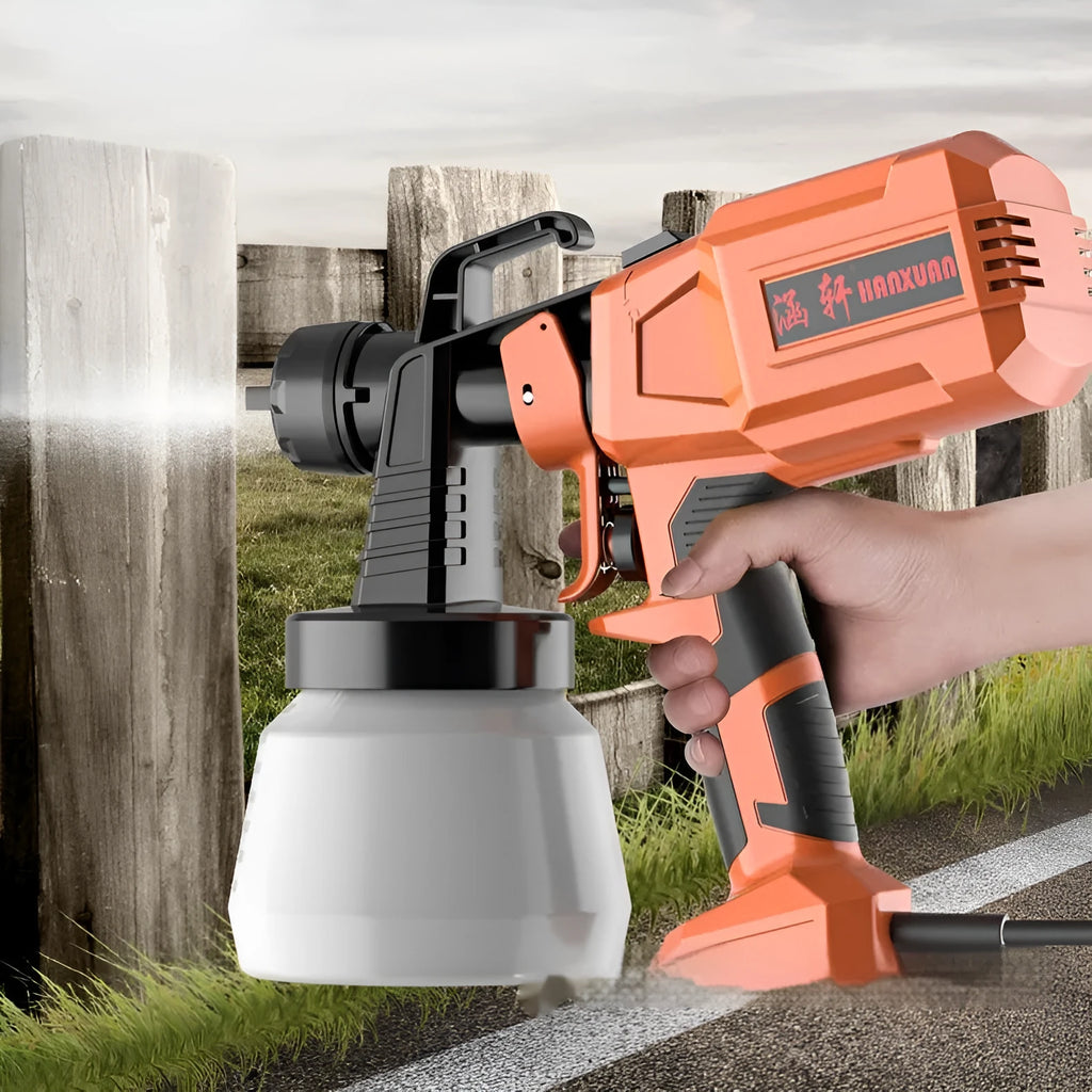 Electric watering can spray gun with plastic body and split aluminium pot on a table