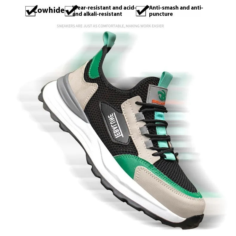 Black and green men's safety shoes with a mesh upper and plastic steel toe cap on a white background.