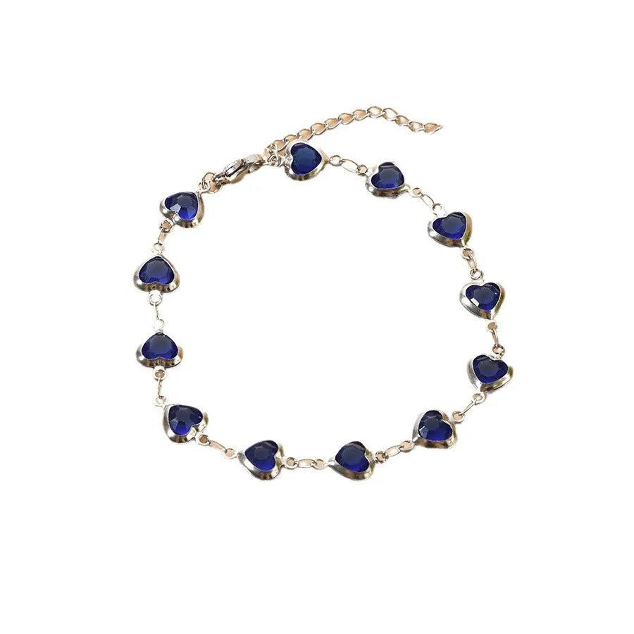 Devil's Eye creative heart stainless steel bracelet in colourful, royal blue, dark green, red, light green, and light blue options