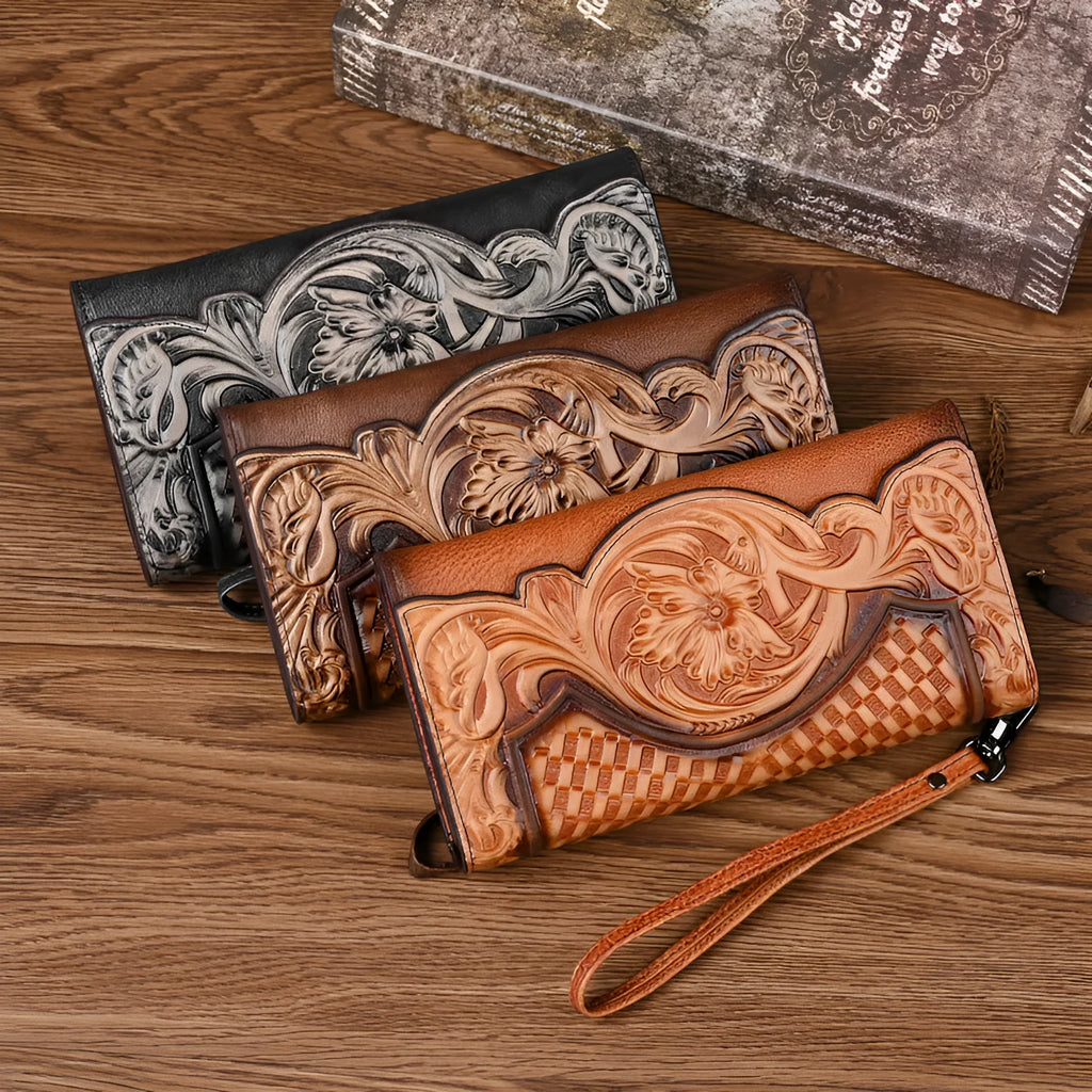Women's brown embossed floral pattern tri-fold leather wallet showing open compartments