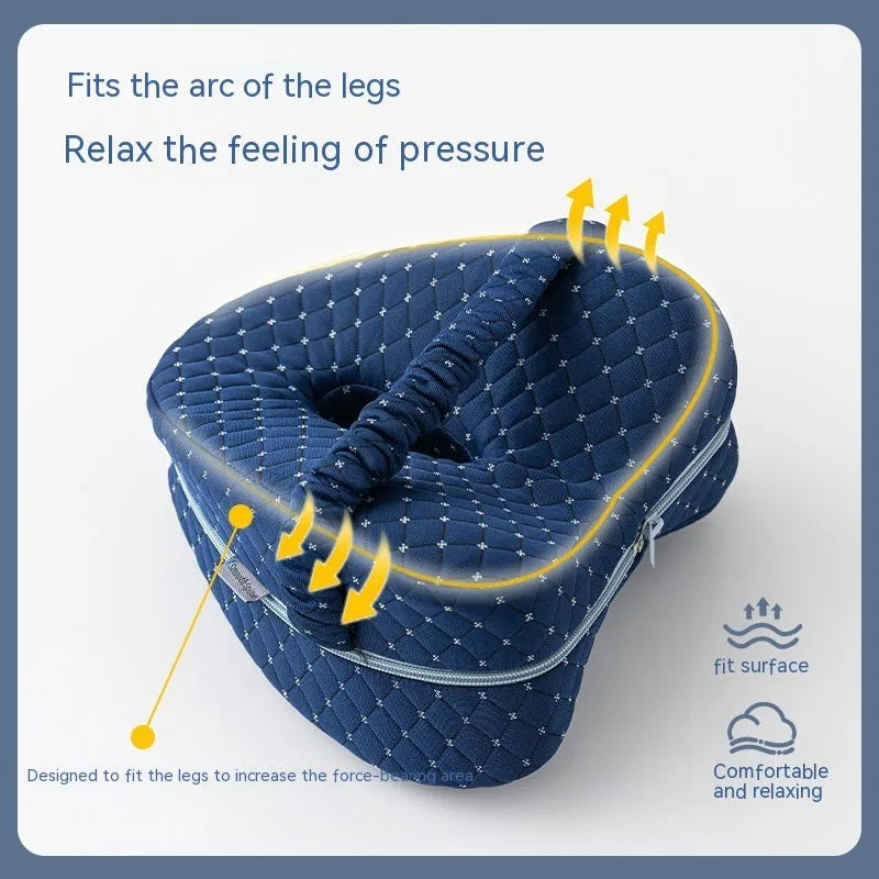 Heart-shaped dark blue jacquard memory foam leg pillow for adult knee support.