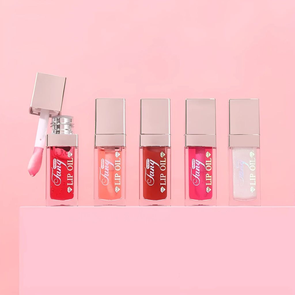 Five colour options of a bright mint lip gloss lipstick with moisturising lip essence oil.